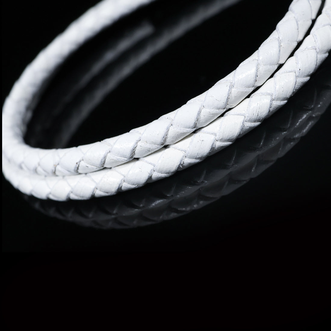 White Braided Leather Bracelet – Pure. Powerful. Refined.